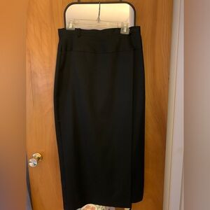 Black pencil skirt, mid length, open pleat on front, size 14